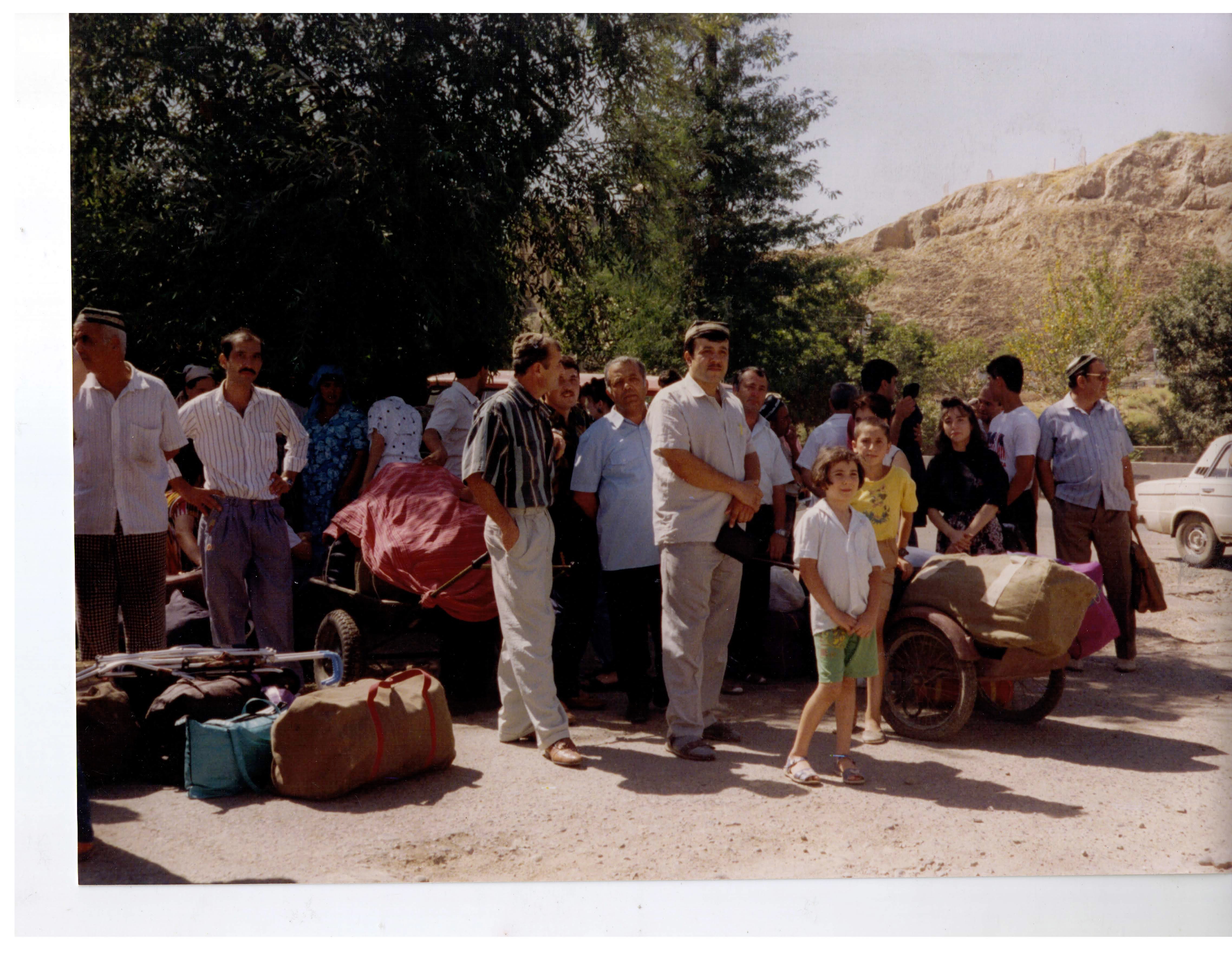 photograph of people assembled together, leaving Samarkind
