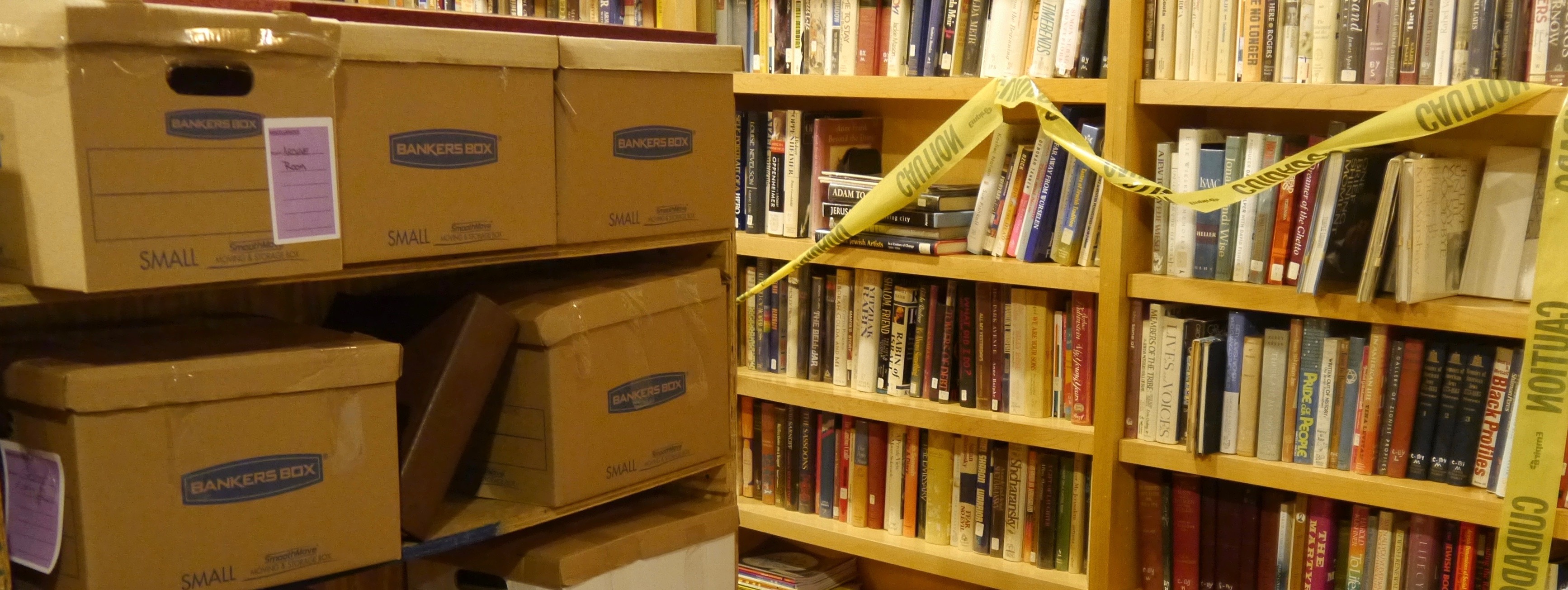 photograph of boxes and bookshelves