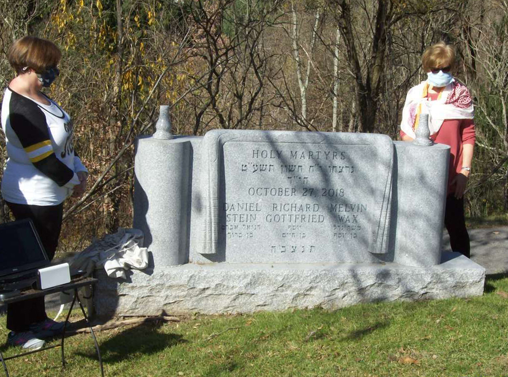 cemetery monument to the three men killed in an attack at the Pittsburgh synagogue