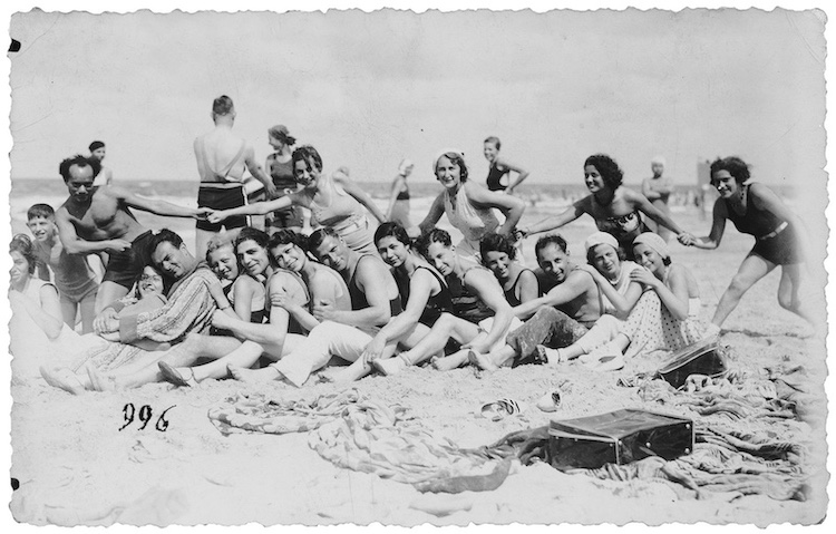 Young people posing on a beach