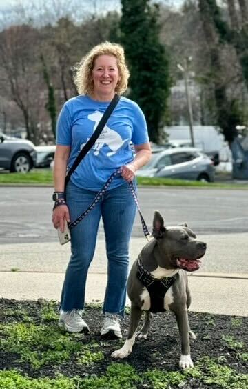 smiling woman with dog