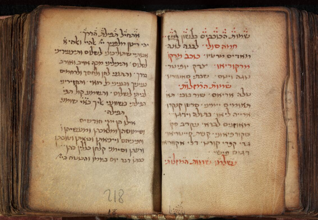 photograph of open book with Hebrew script 