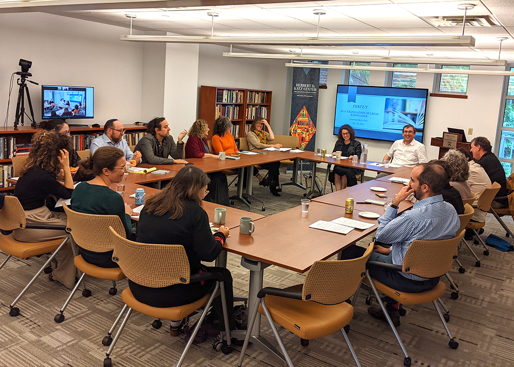 fellows around table at seminar