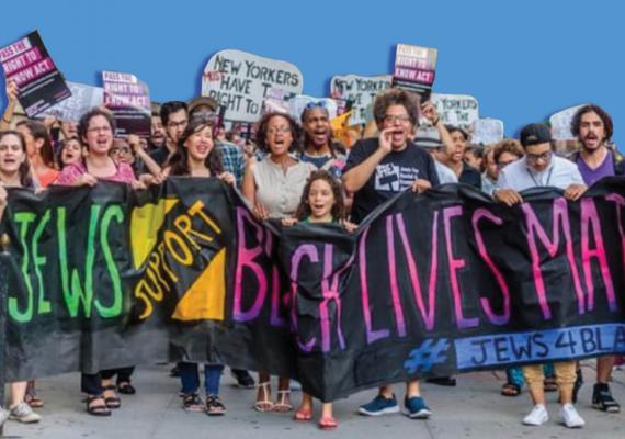 Jews marching with BLM signs