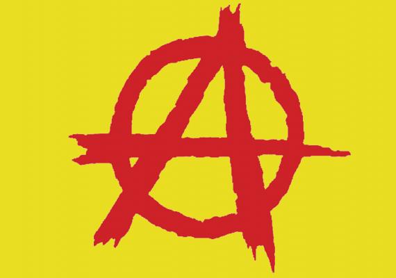 red anarchy symbol on yellow background