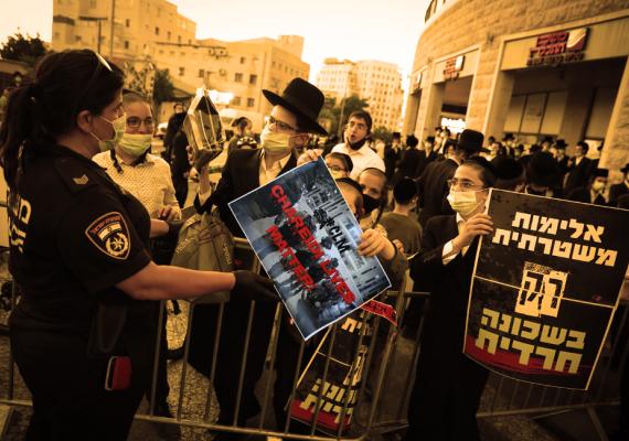 haredi Jews protesting with sign that says, "Charedi Lives Matter"