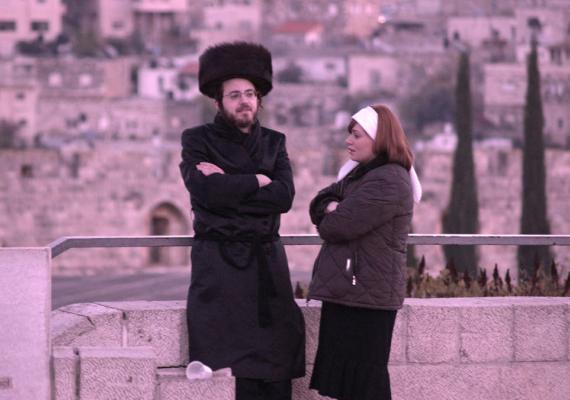 photograph of haredi couple in Jerusalem with pink filter