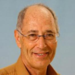 Photograph of man with glasses.